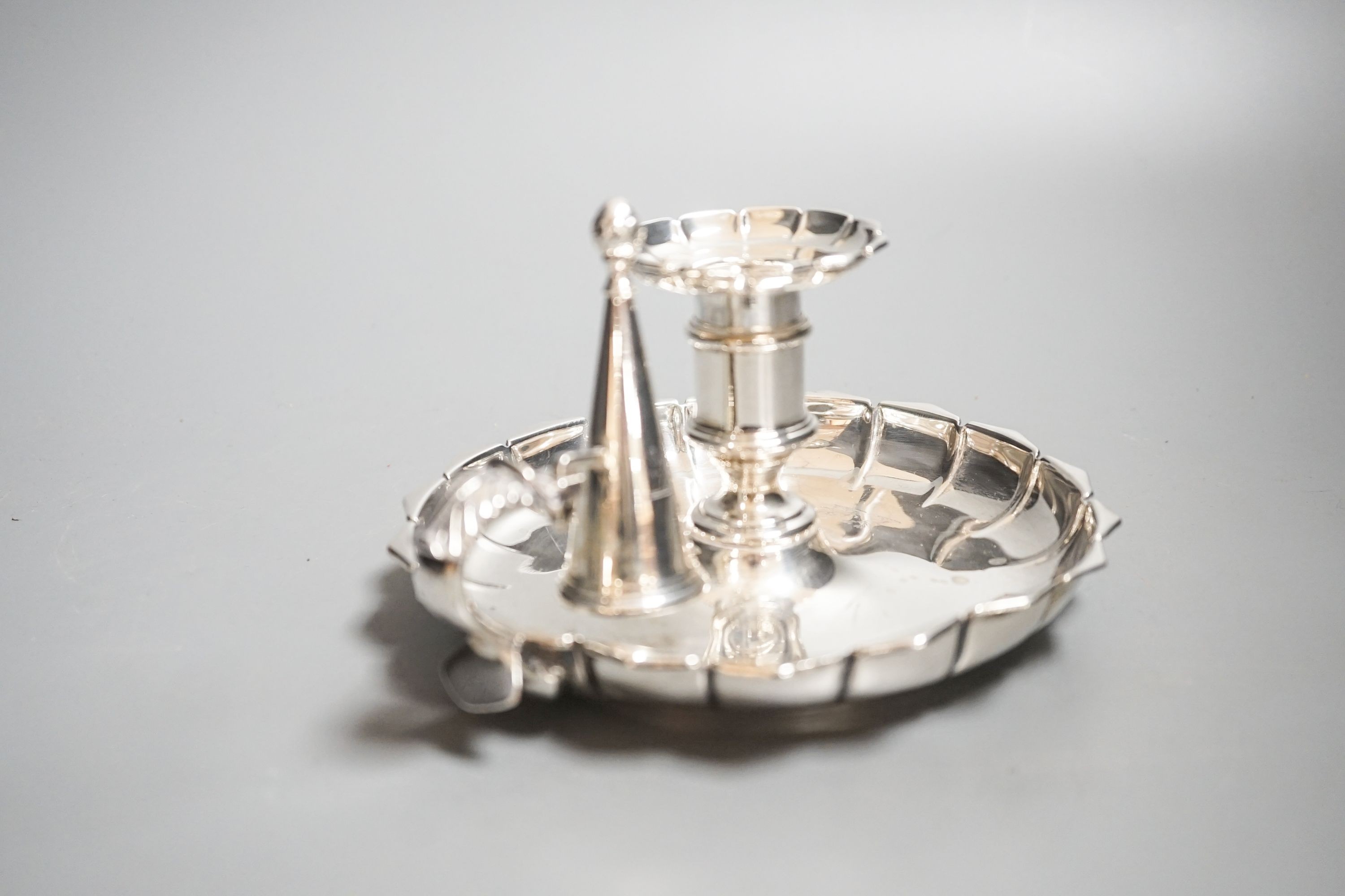 A William IV silver chamberstick, by Robinson, Edkins & Aston, Birmingham, 1835, 16.2cm, in diameter, 11oz.